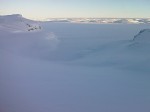 Looking across Blasjo Lake as the sun rises