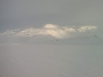 The mountains around Sandvatnet Lake covered in deep snow