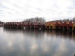 boatsheds in an icy covered bay on the lindesnes peninsular
