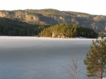 ice-and-sun-around-an-island-on-nedre-oydnavatn-lake