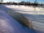 Days 102. Slush on top of the ice on the River Reisa