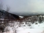 Day 108. Approaching Skoganvarre and its pine clad valley as another snow shower arrives from the north