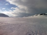 Day 97. The view west across Harvvesjarvi lake and the rugged mountains beyond
