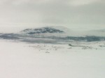 Day 99. Looking down into the Stordalen valley where Norway Sweden and Finland meet at the foot of the crag