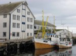 Day 145.1 Older style fishing boats and a wharf in Berlevag harbour