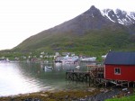 Day 166.1 The heart of Bergsfjord lies across the bay from a robuer with cod hanging to dry, Day 166.1 The heart of Bergsfjord lies across the bay from a robuer with cod hanging to dry,