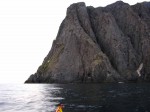 Day 159.5 Looking back at the 300 metre high Nordkapp having paddled round to the west side
