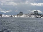 Day 226.2 Fjoloy Fyr lighthouse was surrounded by rock slabs glistening in the sun after the rain showers