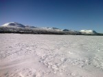 Day 81. Skiing across the Tjieggelvas lake with the mountains to the west of it