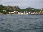 Day 246.2 The small village of Kjerringvik tucked away behind islands on thsi otherwise exposed coast.